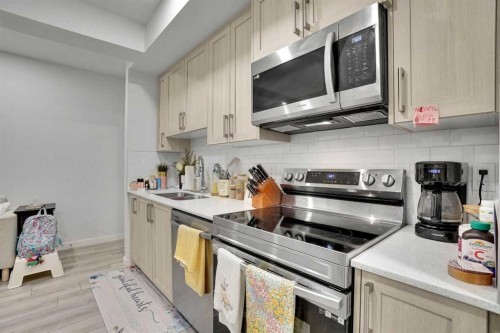 181 Walcrest Boulevard, Calgary, AB - Indoor Photo Showing Kitchen With Double Sink