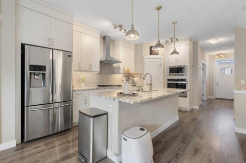 227 148 Avenue Nw, Calgary, AB - Indoor Photo Showing Kitchen With Stainless Steel Kitchen With Upgraded Kitchen