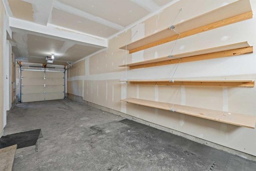 306 Ascot Circle Sw, Calgary, AB - Indoor Photo Showing Garage