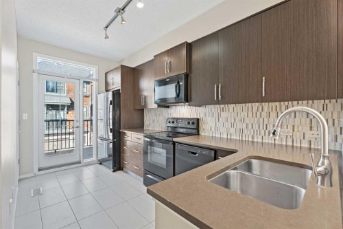 306 Ascot Circle Sw, Calgary, AB - Indoor Photo Showing Kitchen With Stainless Steel Kitchen With Double Sink