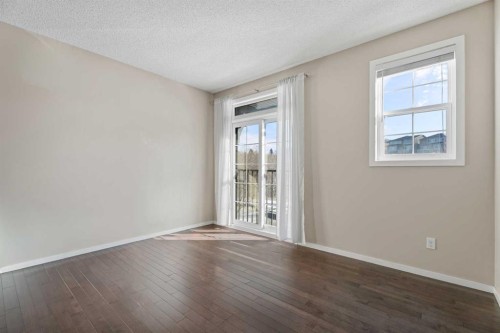 306 Ascot Circle Sw, Calgary, AB - Indoor Photo Showing Other Room