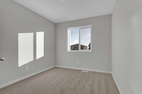 15 Corner Glen Drive Ne, Calgary, AB - Indoor Photo Showing Other Room