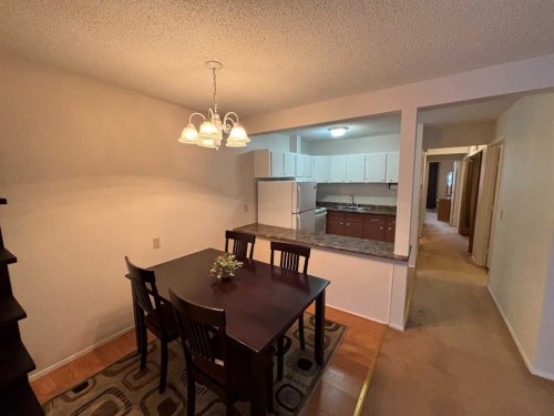 511-200 Brookpark Drive Sw, Calgary, AB - Indoor Photo Showing Dining Room