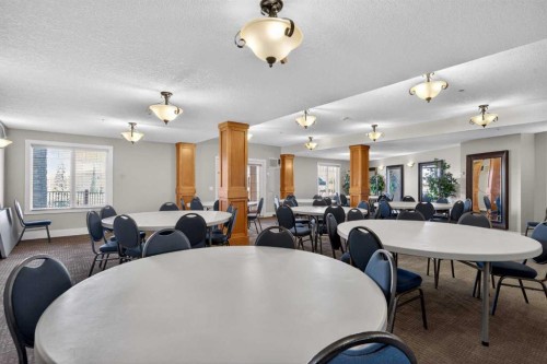 203-77 George Fox Trail, Cochrane, AB - Indoor Photo Showing Dining Room