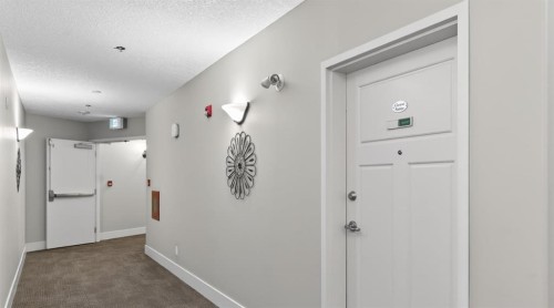 203-77 George Fox Trail, Cochrane, AB - Indoor Photo Showing Other Room