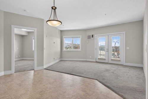 203-77 George Fox Trail, Cochrane, AB - Indoor Photo Showing Other Room