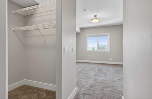 203-77 George Fox Trail, Cochrane, AB - Indoor With Storage