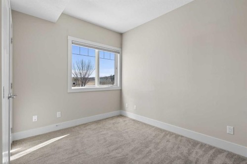203-77 George Fox Trail, Cochrane, AB - Indoor Photo Showing Other Room