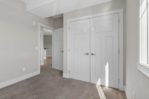 203-77 George Fox Trail, Cochrane, AB - Indoor Photo Showing Other Room