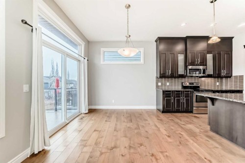 7904 Masters Boulevard Se, Calgary, AB - Indoor Photo Showing Kitchen With Upgraded Kitchen