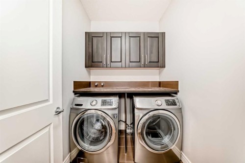 7904 Masters Boulevard Se, Calgary, AB - Indoor Photo Showing Laundry Room