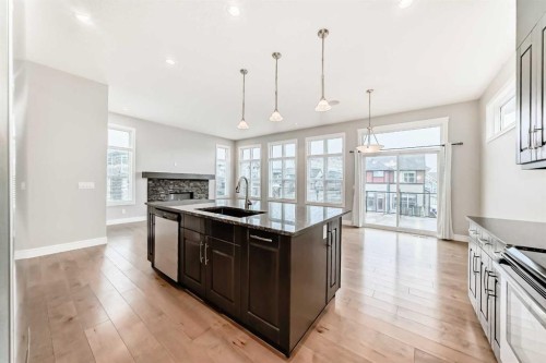 7904 Masters Boulevard Se, Calgary, AB - Indoor Photo Showing Kitchen With Upgraded Kitchen