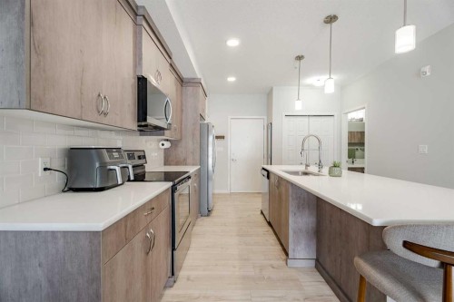 112-20 Seton Park Se, Calgary, AB - Indoor Photo Showing Kitchen With Upgraded Kitchen