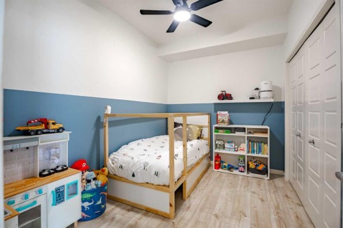 112-20 Seton Park Se, Calgary, AB - Indoor Photo Showing Bedroom