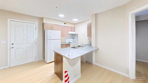 222-355 Taralake Way Ne, Calgary, AB - Indoor Photo Showing Kitchen