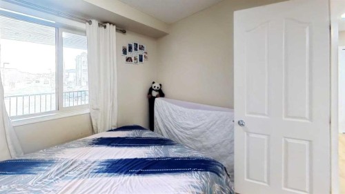 222-355 Taralake Way Ne, Calgary, AB - Indoor Photo Showing Bedroom