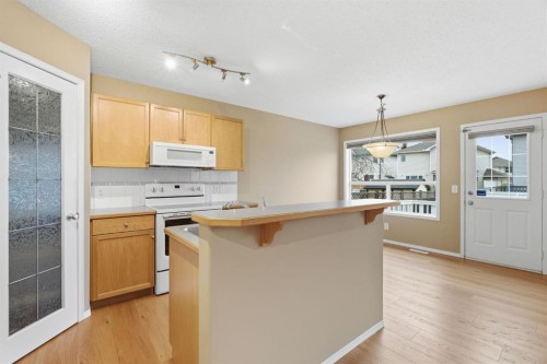 59 Silver Springs Way Nw, Airdrie, AB - Indoor Photo Showing Kitchen