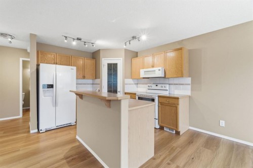 59 Silver Springs Way Nw, Airdrie, AB - Indoor Photo Showing Kitchen