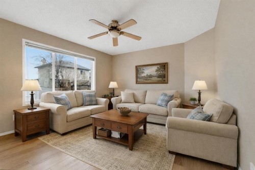 59 Silver Springs Way Nw, Airdrie, AB - Indoor Photo Showing Living Room