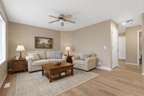 59 Silver Springs Way Nw, Airdrie, AB - Indoor Photo Showing Living Room