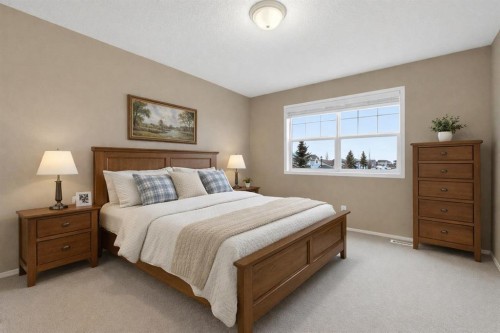 59 Silver Springs Way Nw, Airdrie, AB - Indoor Photo Showing Bedroom
