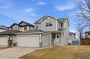 59 Silver Springs Way Nw, Airdrie, AB  - Outdoor With Facade 