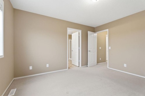 59 Silver Springs Way Nw, Airdrie, AB - Indoor Photo Showing Other Room