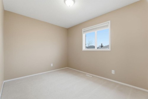59 Silver Springs Way Nw, Airdrie, AB - Indoor Photo Showing Other Room