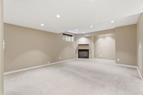 59 Silver Springs Way Nw, Airdrie, AB - Indoor With Fireplace