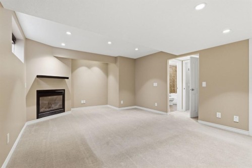 59 Silver Springs Way Nw, Airdrie, AB - Indoor With Fireplace