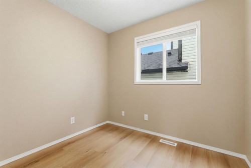 59 Silver Springs Way Nw, Airdrie, AB - Indoor Photo Showing Other Room