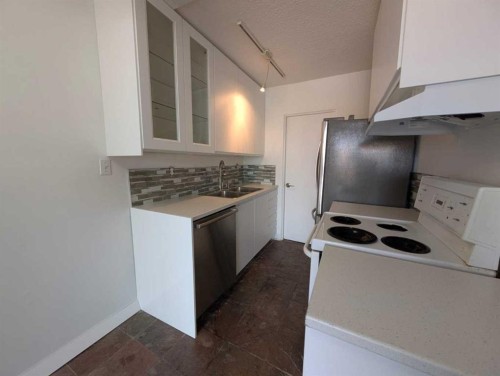Calgary, AB - Indoor Photo Showing Kitchen