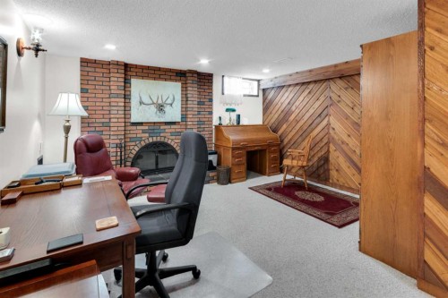 4640 Rundlehill Road Ne, Calgary, AB - Indoor Photo Showing Office With Fireplace