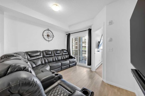 3202-215 Legacy Boulevard Se, Calgary, AB - Indoor Photo Showing Living Room