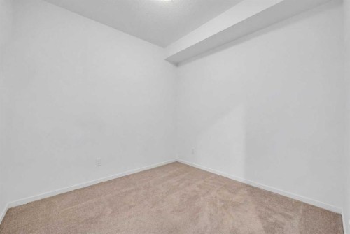 3202-215 Legacy Boulevard Se, Calgary, AB - Indoor Photo Showing Other Room