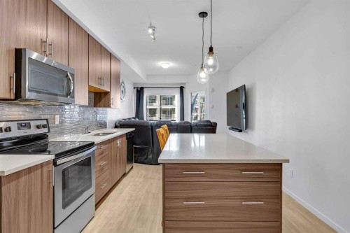 3202-215 Legacy Boulevard Se, Calgary, AB - Indoor Photo Showing Kitchen With Upgraded Kitchen