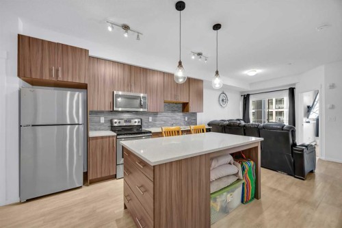 3202-215 Legacy Boulevard Se, Calgary, AB - Indoor Photo Showing Kitchen With Upgraded Kitchen