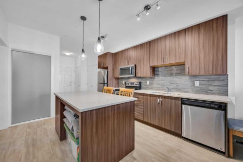 3202-215 Legacy Boulevard Se, Calgary, AB - Indoor Photo Showing Kitchen With Upgraded Kitchen