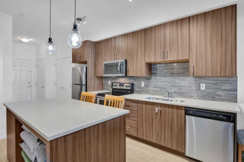 3202-215 Legacy Boulevard Se, Calgary, AB - Indoor Photo Showing Kitchen With Double Sink With Upgraded Kitchen