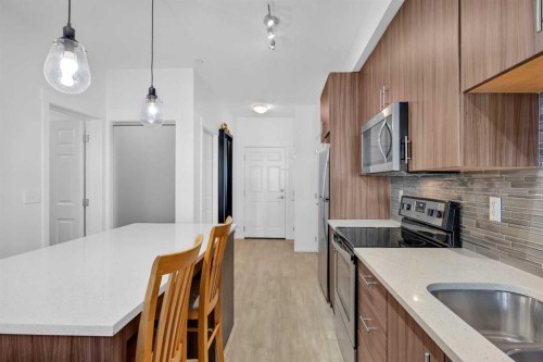 3202-215 Legacy Boulevard Se, Calgary, AB - Indoor Photo Showing Kitchen