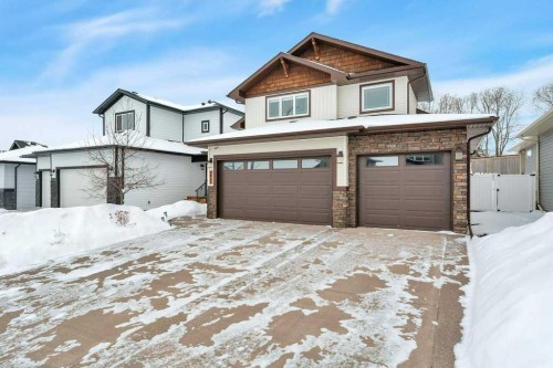5825 Maple Crescent, Innisfail, AB - Outdoor With Facade