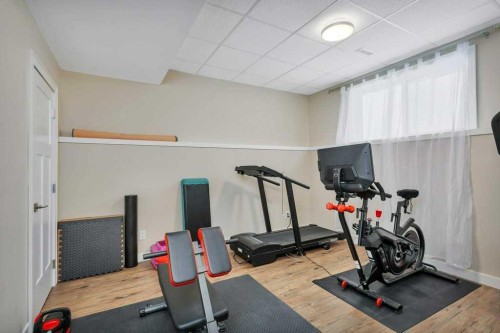 5825 Maple Crescent, Innisfail, AB - Indoor Photo Showing Gym Room