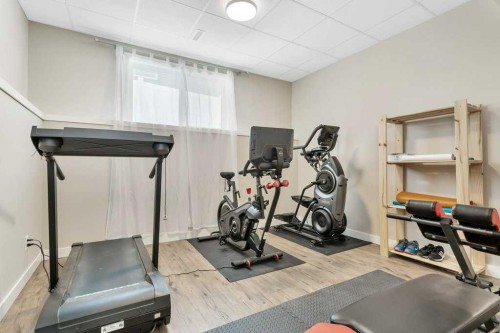 5825 Maple Crescent, Innisfail, AB - Indoor Photo Showing Gym Room