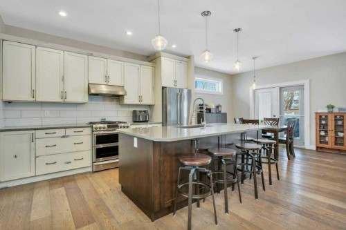 5825 Maple Crescent, Innisfail, AB - Indoor Photo Showing Kitchen With Upgraded Kitchen