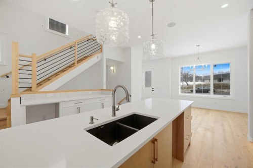 4711 19 Avenue Nw, Calgary, AB - Indoor Photo Showing Kitchen With Double Sink