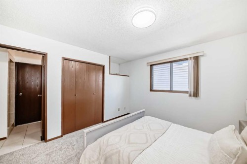 6735 Temple Drive Ne, Calgary, AB - Indoor Photo Showing Bedroom