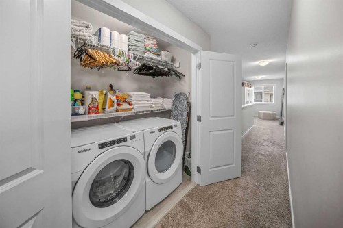 210 Crestbrook Common Sw, Calgary, AB - Indoor Photo Showing Laundry Room