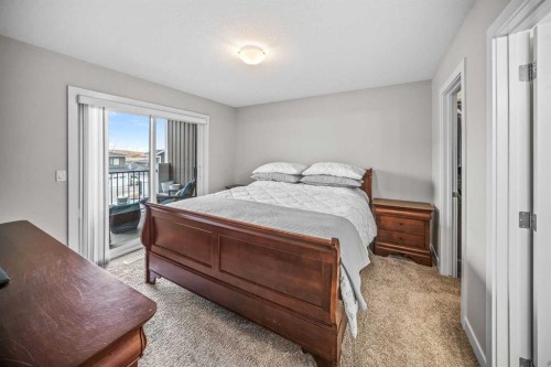 210 Crestbrook Common Sw, Calgary, AB - Indoor Photo Showing Bedroom