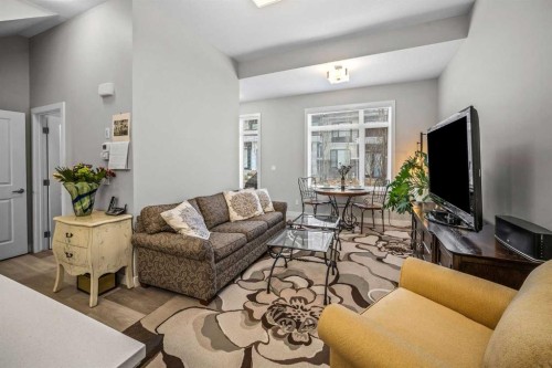 210 Crestbrook Common Sw, Calgary, AB - Indoor Photo Showing Living Room