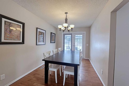 15 Edgeland Mews Nw, Calgary, AB - Indoor Photo Showing Dining Room